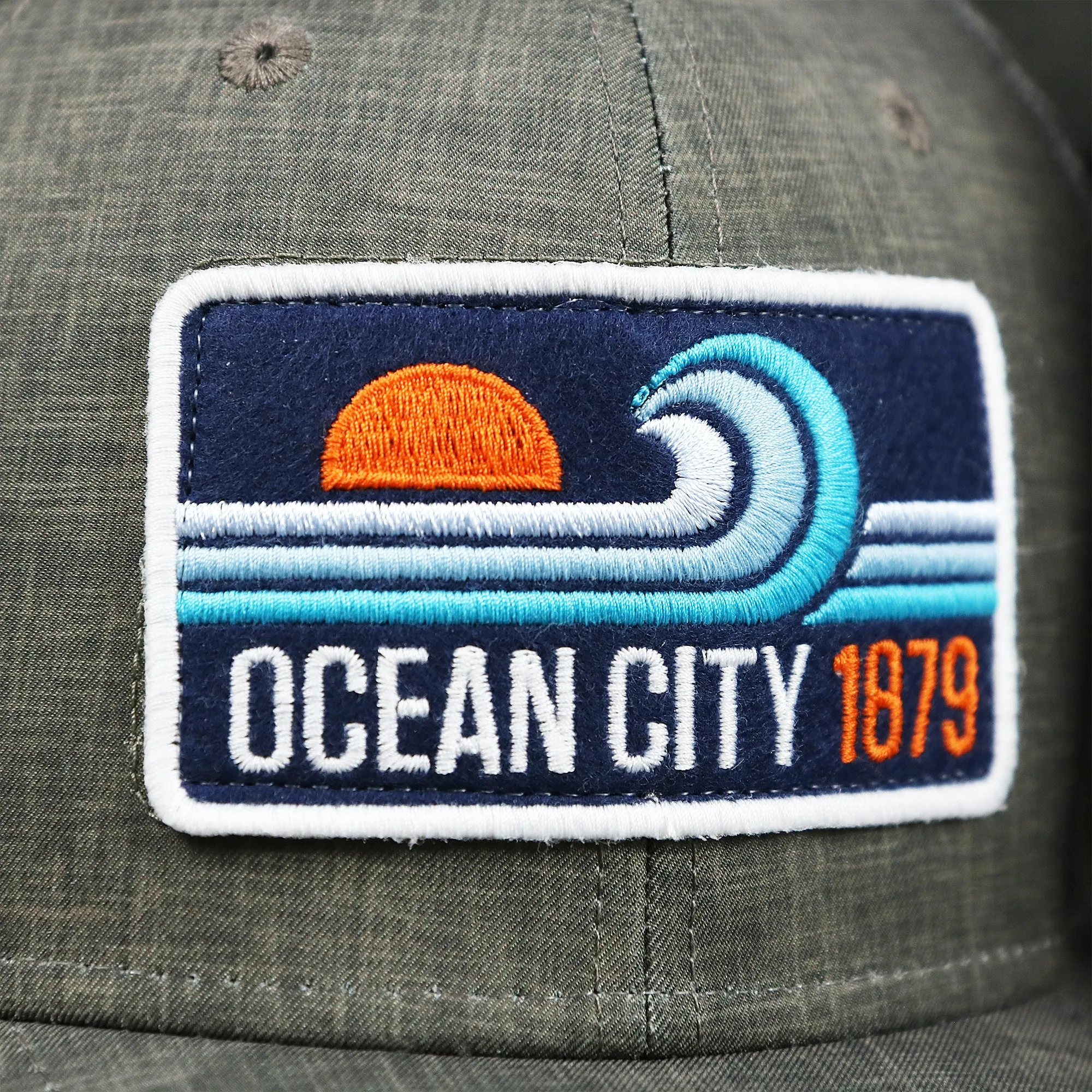 OCNJ Ocean City 1879 Sunset Wave Logo Mesh Stretch FIt Hat | Dark Green And Dark Grey Stretch Fit Hat