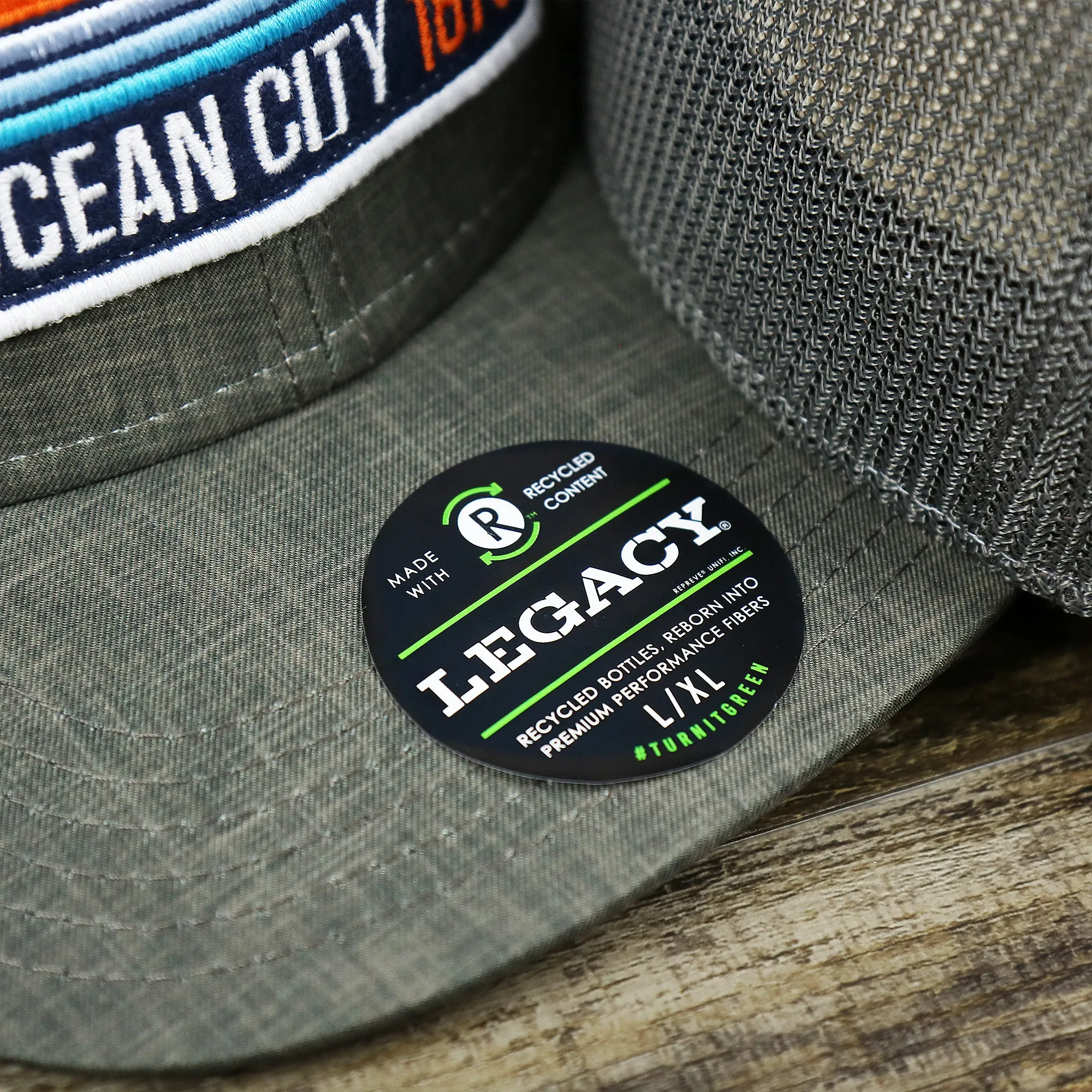 OCNJ Ocean City 1879 Sunset Wave Logo Mesh Stretch FIt Hat | Dark Green And Dark Grey Stretch Fit Hat