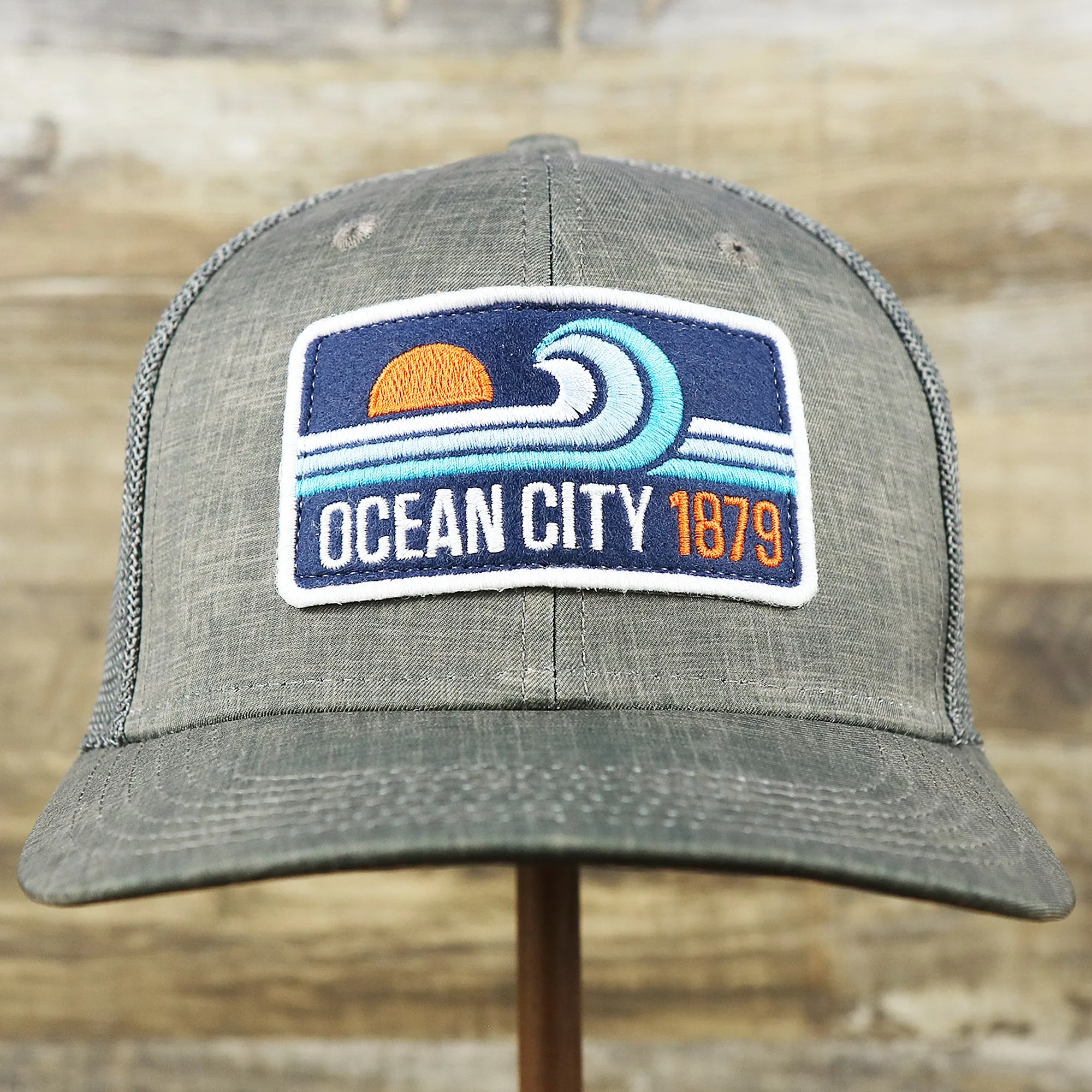 OCNJ Ocean City 1879 Sunset Wave Logo Mesh Stretch FIt Hat | Dark Green And Dark Grey Stretch Fit Hat